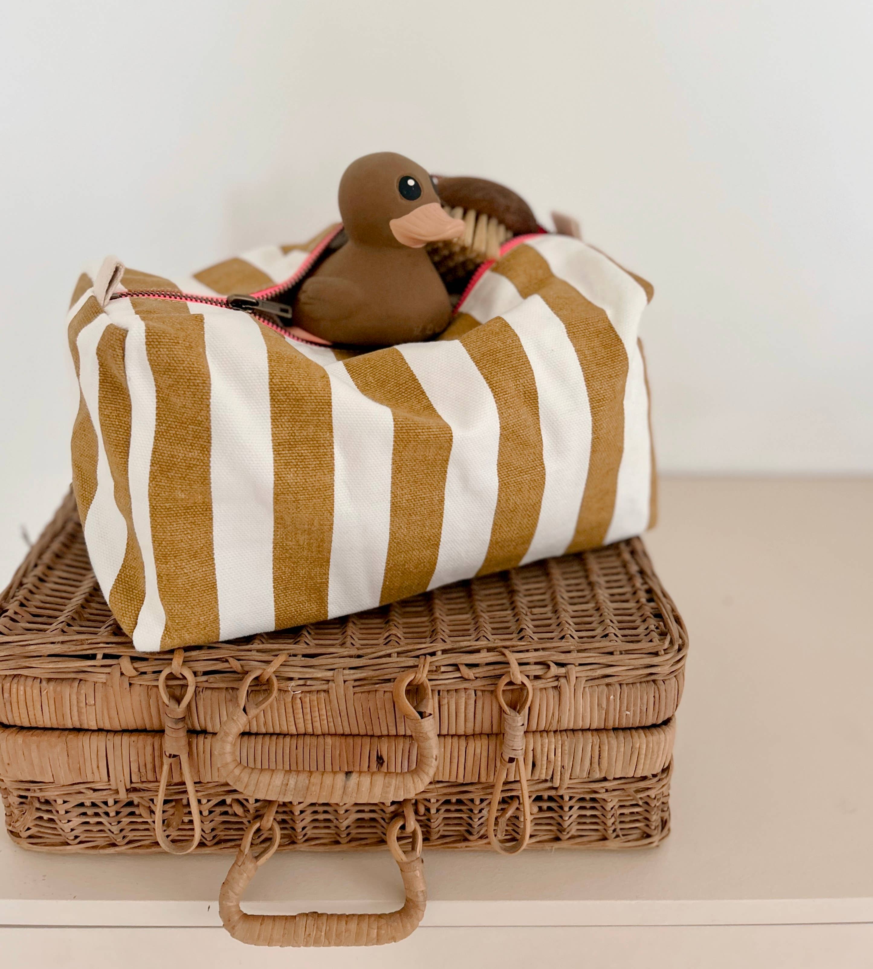 VIC TOILETRY BAG STRPES CARAMEL for wholesale on Faire1