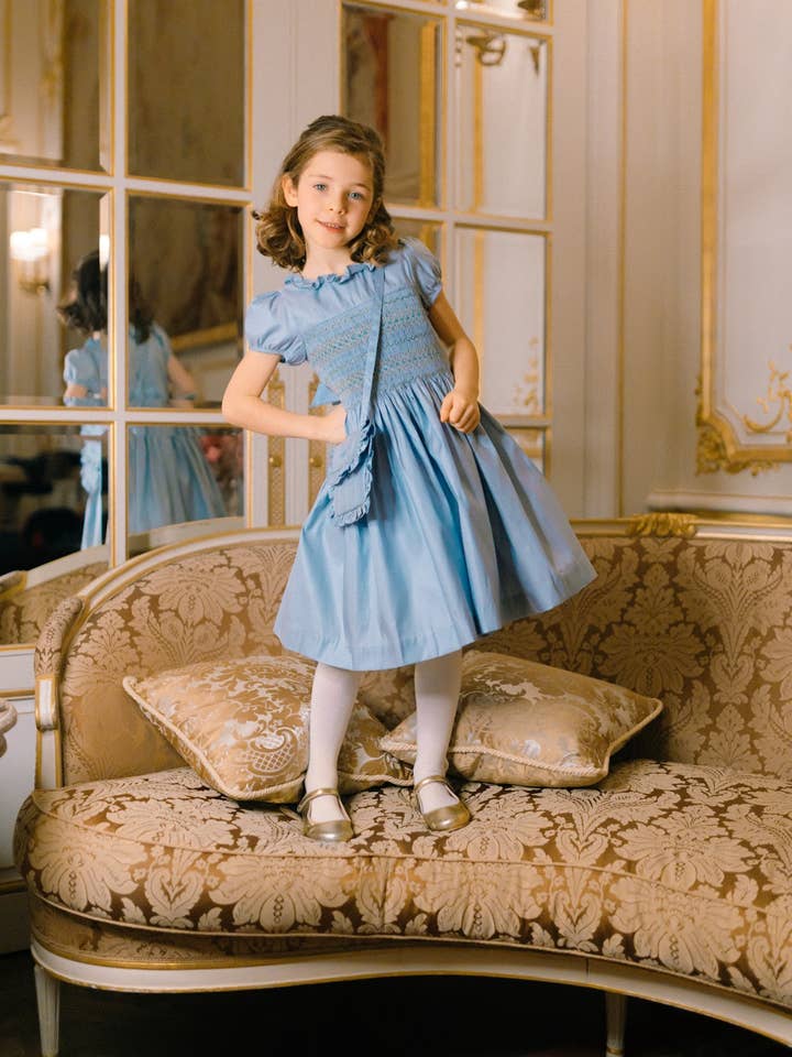 Astrid Blue Taffeta Smocked Girl Dress for wholesale by Antoinette Paris