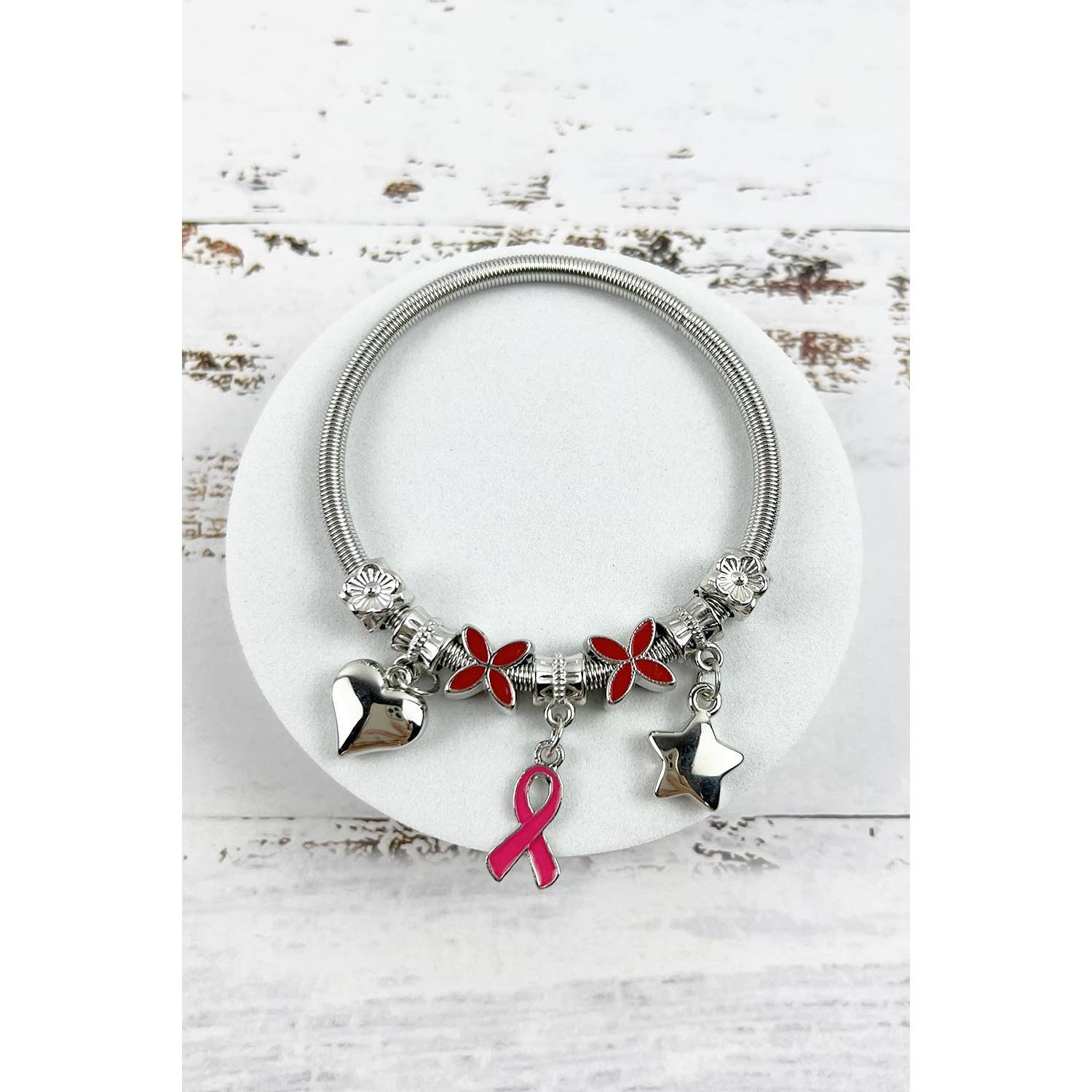 ASSORTED BREAST CANCER AWARENESS PINK RIBBON CHARM BANGLE BRACELET for wholesale on Faire3