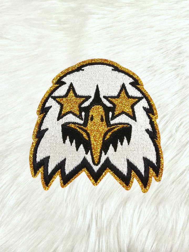 Small Black White Eagle Gold Glitter Mascot with Star Eyes Embroidery Iron On Patch for wholesale by Scratch Decor