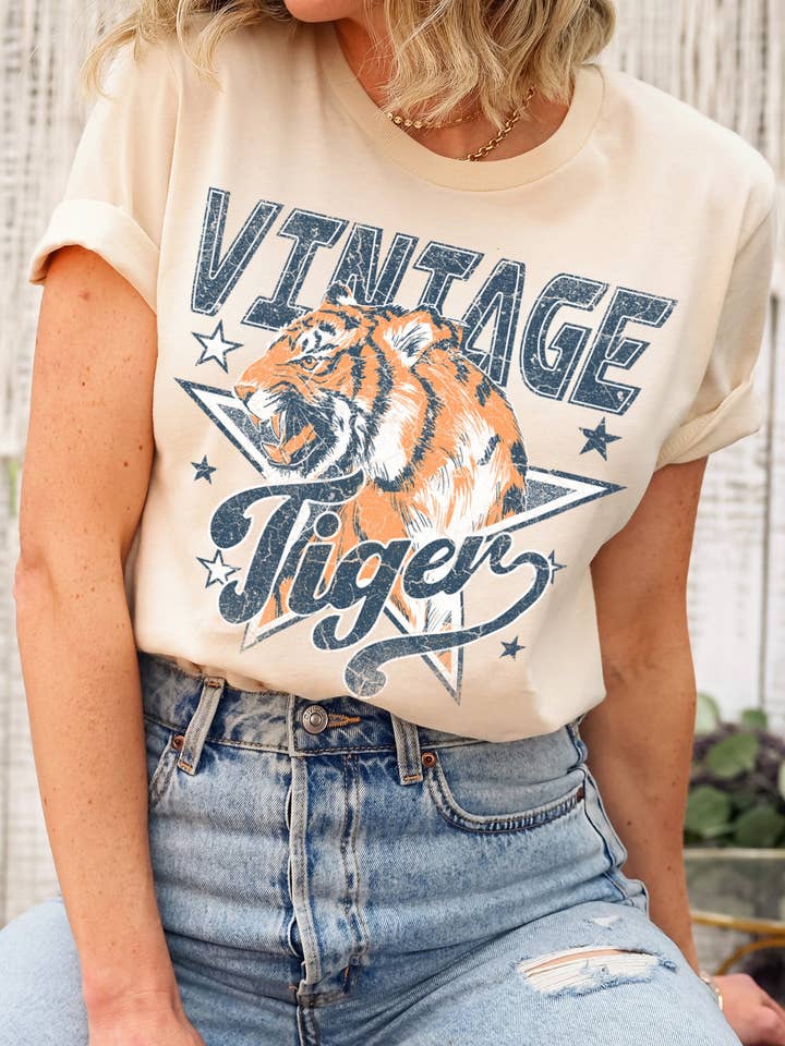 1105T - Cotton Jersey T-shirt Vintage Tiger and other Purchase Wholesale tiger graphic tee. Free Returns & Net 60 Terms on Faire trending on Faire.