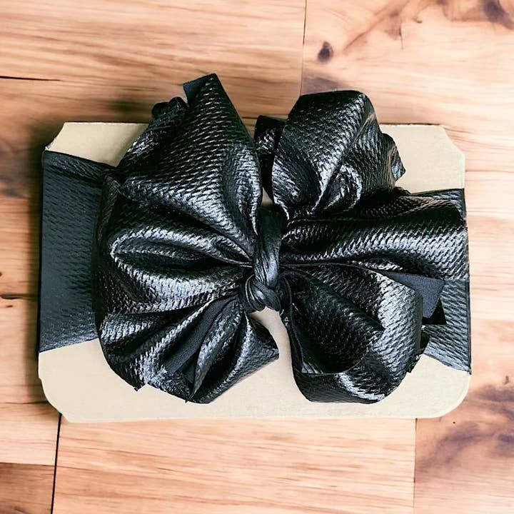 BLACK #3 FAUX LEATHER BIG TASSEL HEADBAND. F-DLH2432K for wholesale on Faire