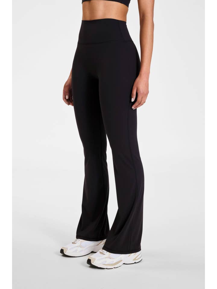 Black ALLFENIX CloudCore Flared Legging for wholesale on Faire
