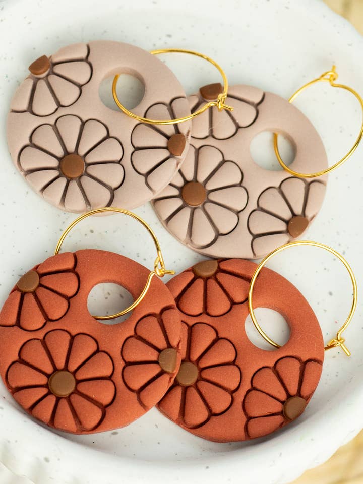 18k Embossed Floral Disc Hoops for wholesale by EJ Clay Co