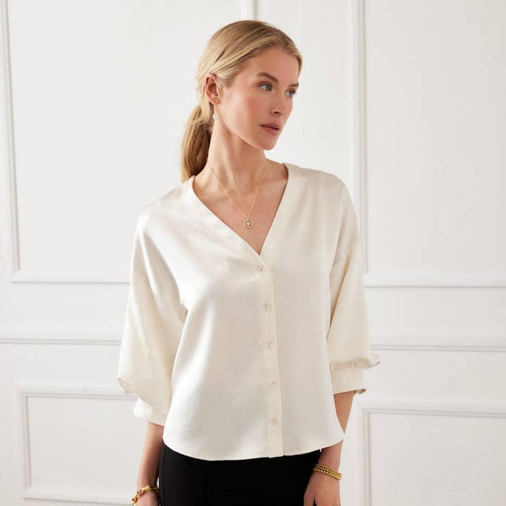 Lantern Sleeve Crystal Rhinestone Button Satin Top and other Purchase Wholesale rhinestone buttons. Free Returns & Net 60 Terms on Faire trending on Faire.