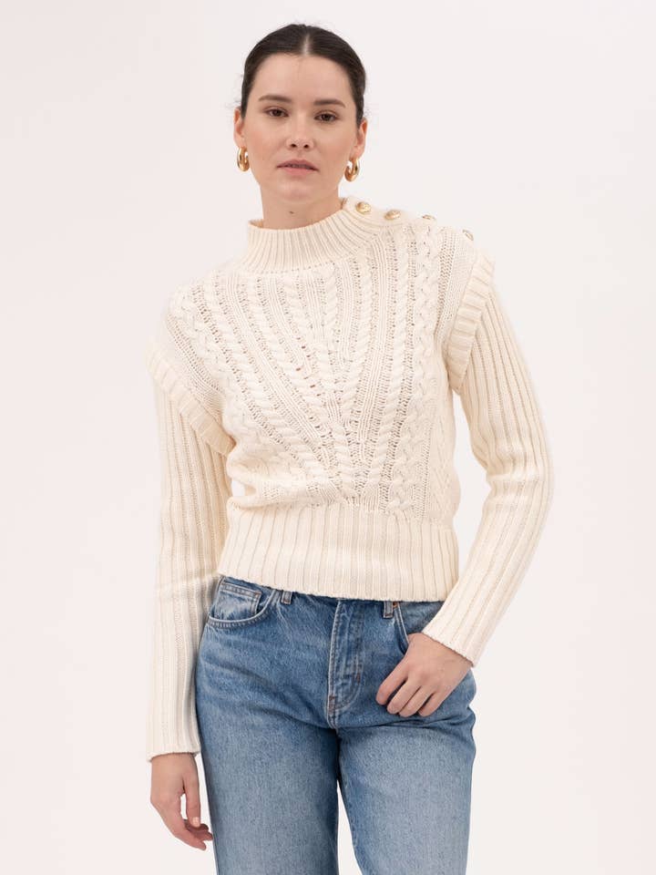 CREAM MOCK NECK SIDE SHOULDER BUTTON CABLE KNIT SWEATER for wholesale on Faire