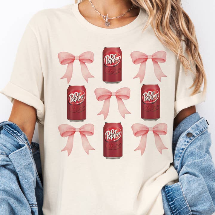 Dr Pepper Pink Bow Graphic Tee Coquette Soda Shop Coffee Tea for wholesale by Par.tees by Party On!