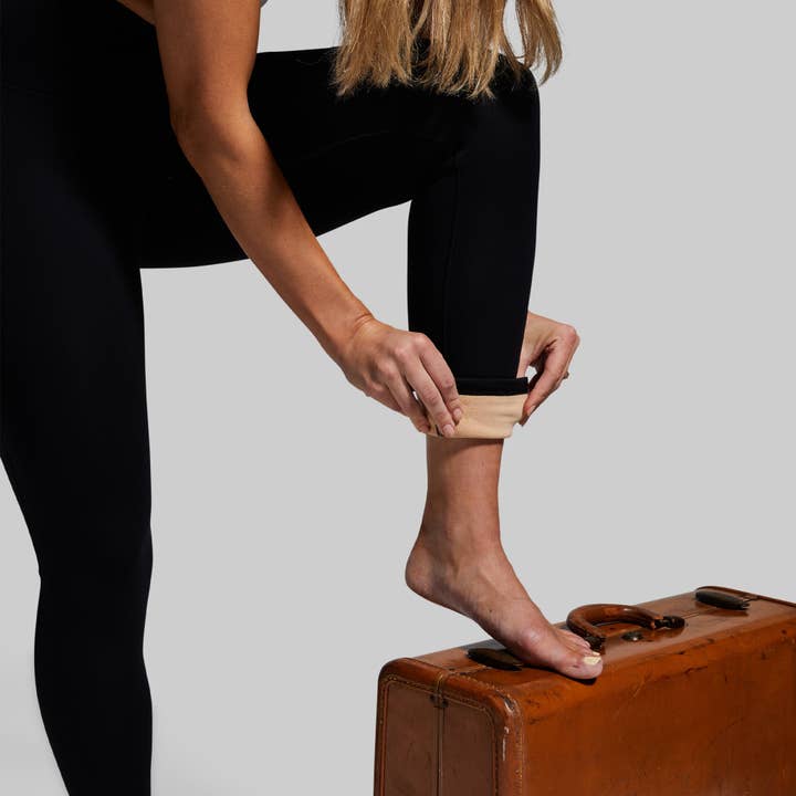 Legging doublé en polaire (noir) pour la vente par Born Primitive