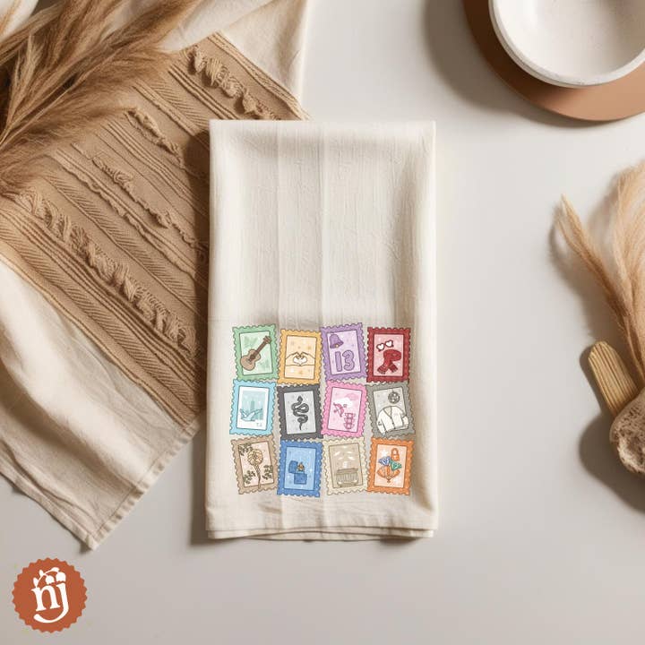 Nearly June Design Co - Wholesale Tea Towel - Eras Inspired Stamps Tea Towel 2