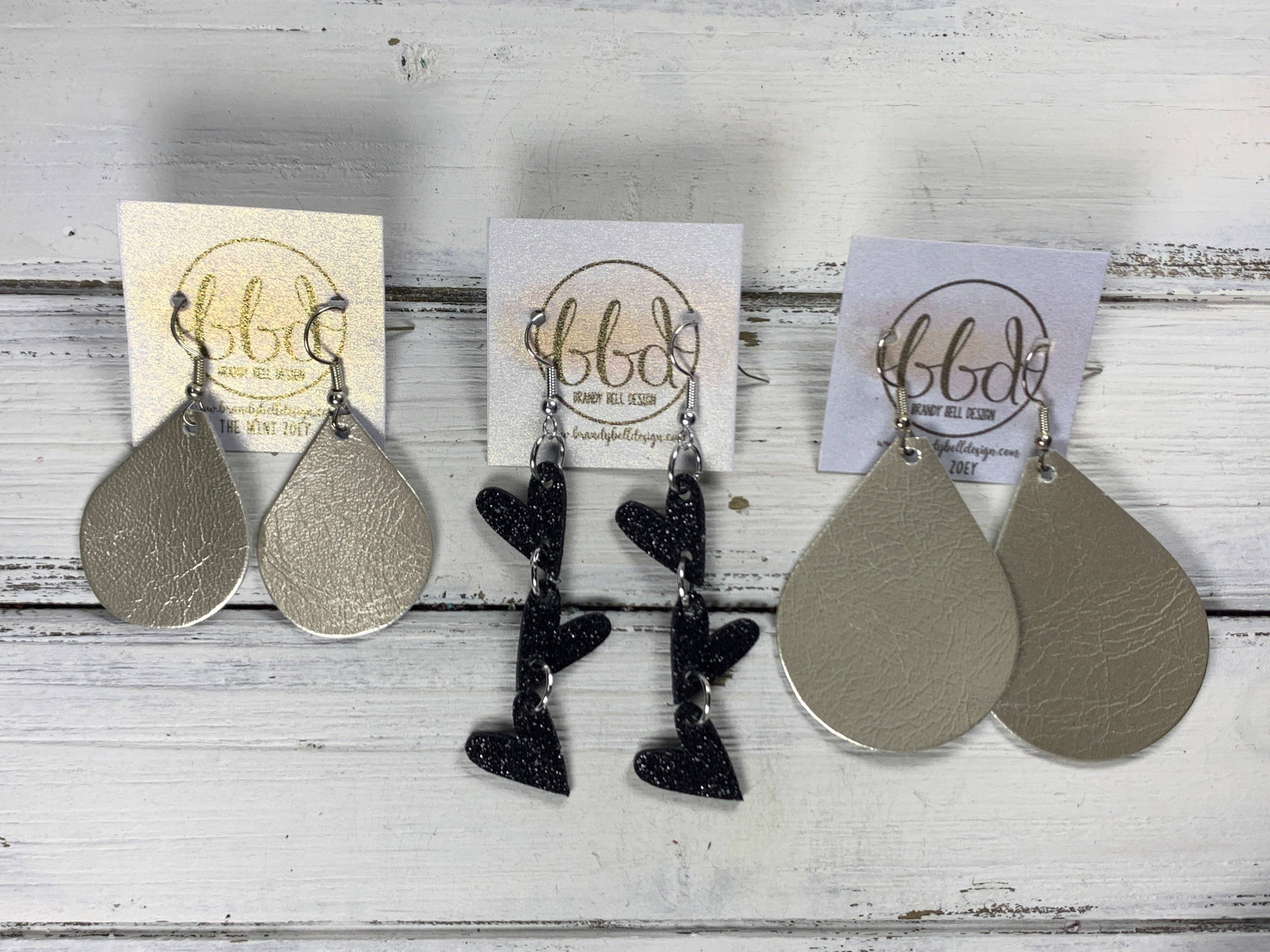 Brandy Bell Design - Wholesale Dangle Earrings - LINKED HEARTS -   Tiny Hearts Collection || Leather Earrings  ||   <BR> IRIDESCENT WHITE GLITTER ON THICK LEATHER1