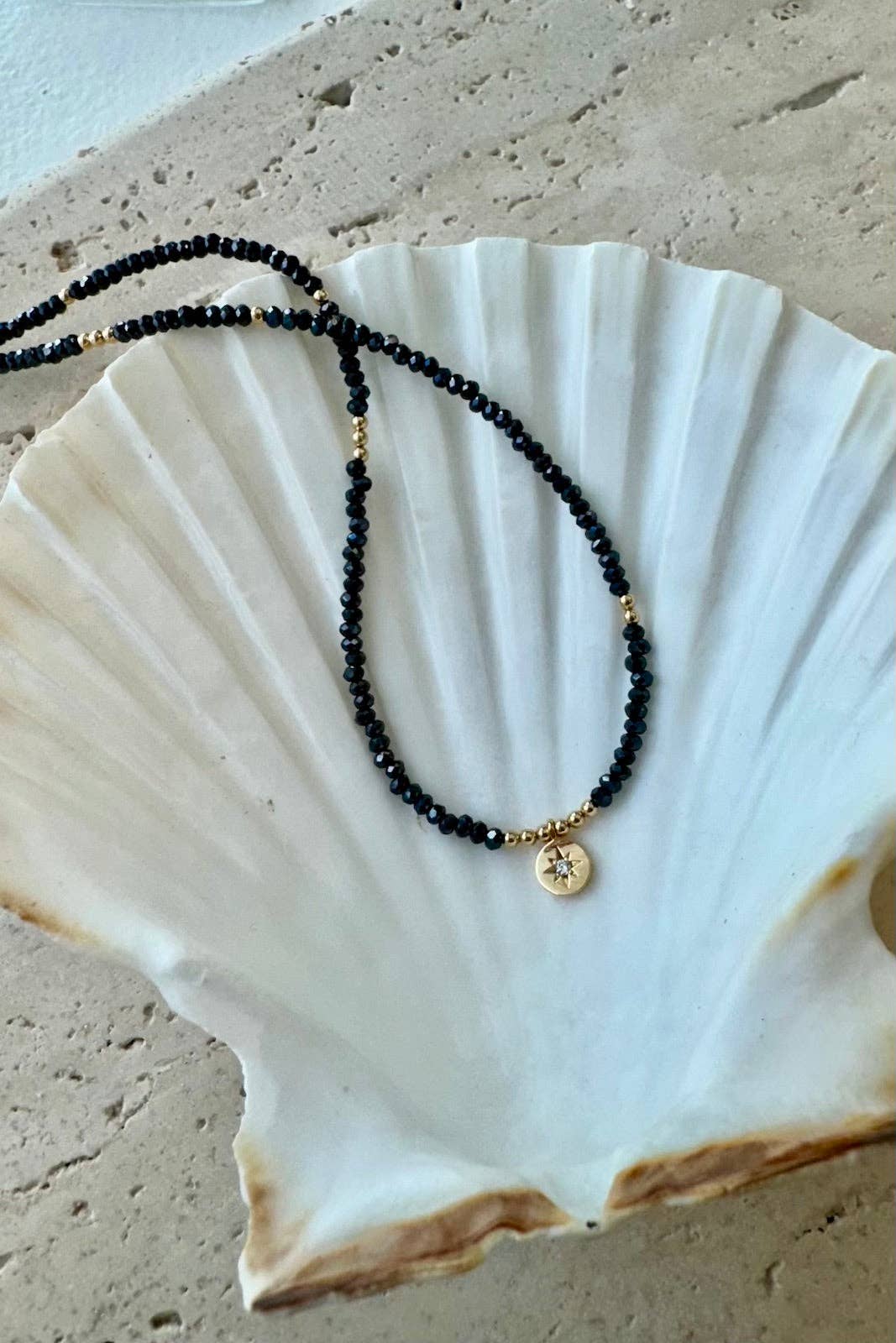 HEMATITE BEADED STAR MEDALLION NECKLACE for wholesale on Faire3