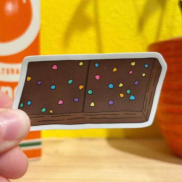 Klistermärke Kosmisk Brownie för wholesale av Chateau Blanche