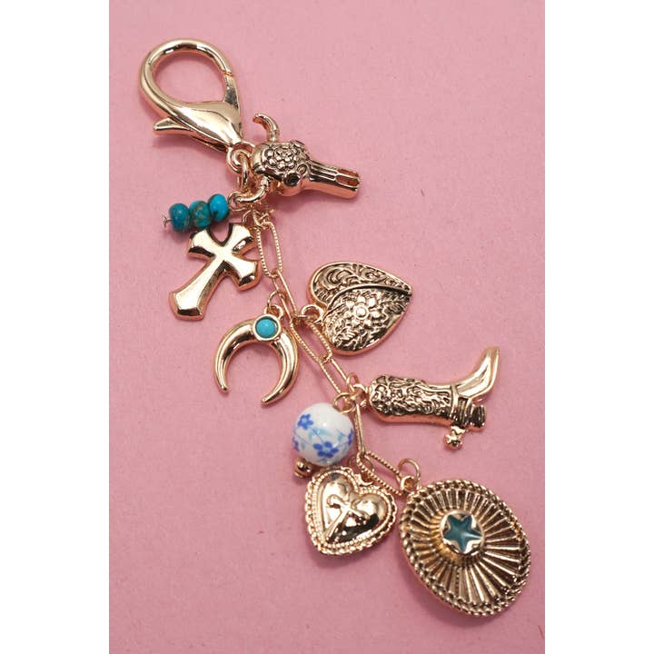 Gold WESTERN CROSS HAT BOOT HEART BAG CHARM | 80K048 for wholesale on Faire