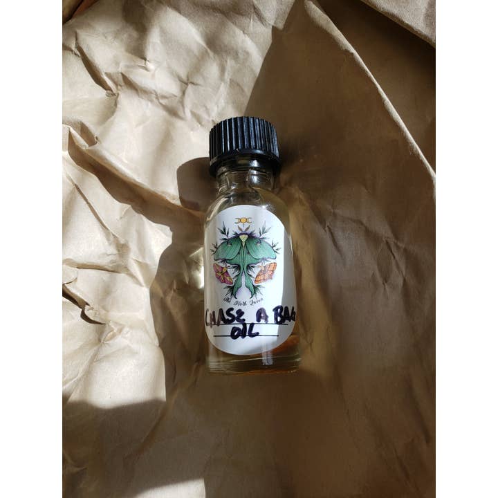 Huile Chase A Bag pour la vente par The Moth Queen