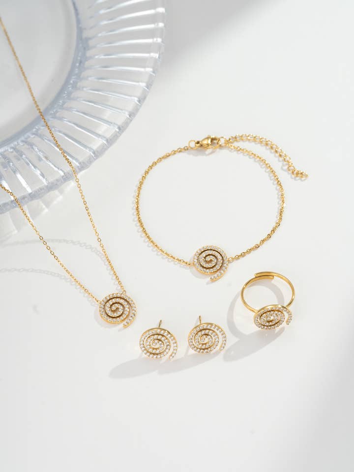 4-piece spiral set: necklace, ring, bracelet, earrings for wholesale by COSMOS