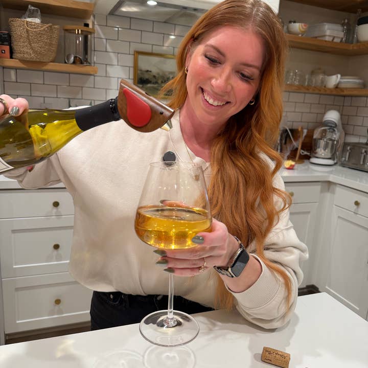 Songbird Specialties® "Singing" Wine Bottle Pourer, Red for wholesale by Totally Bamboo