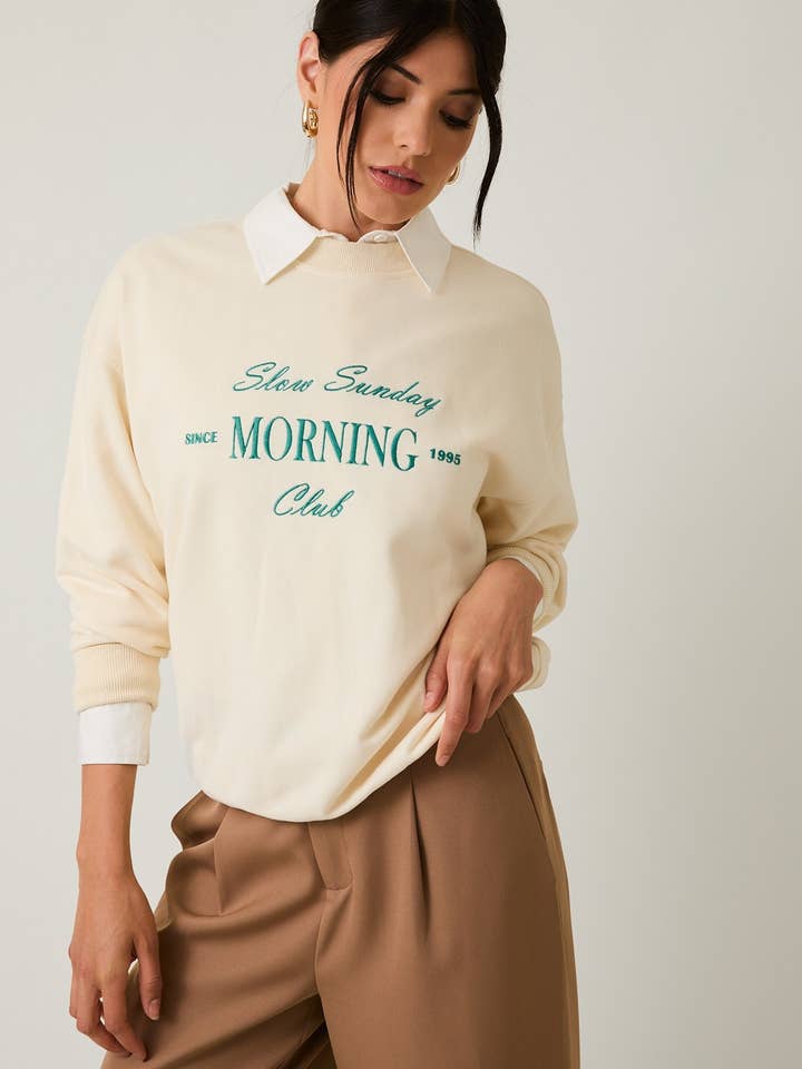 Slow Sunday Morning Club Sweatshirt for wholesale by Ashley’s Clothing Design Inc.
