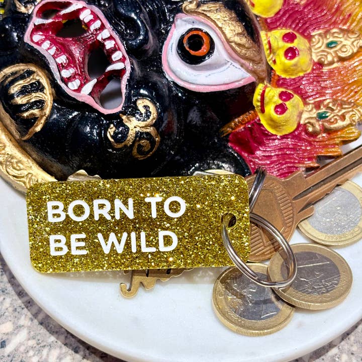 FÖDD ATT VARA VILD Nyckelring med glitter Mer kärlek för wholesale av Plus de Love