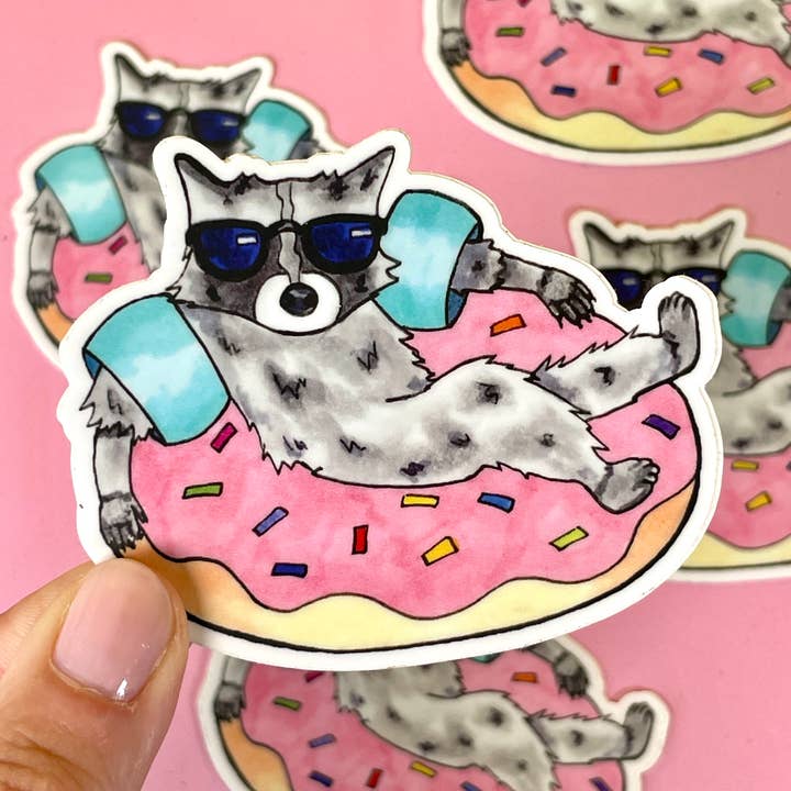 Adesivo de vinil impermeável Raccoon Donut Float por atacado de quirky burp illustrations