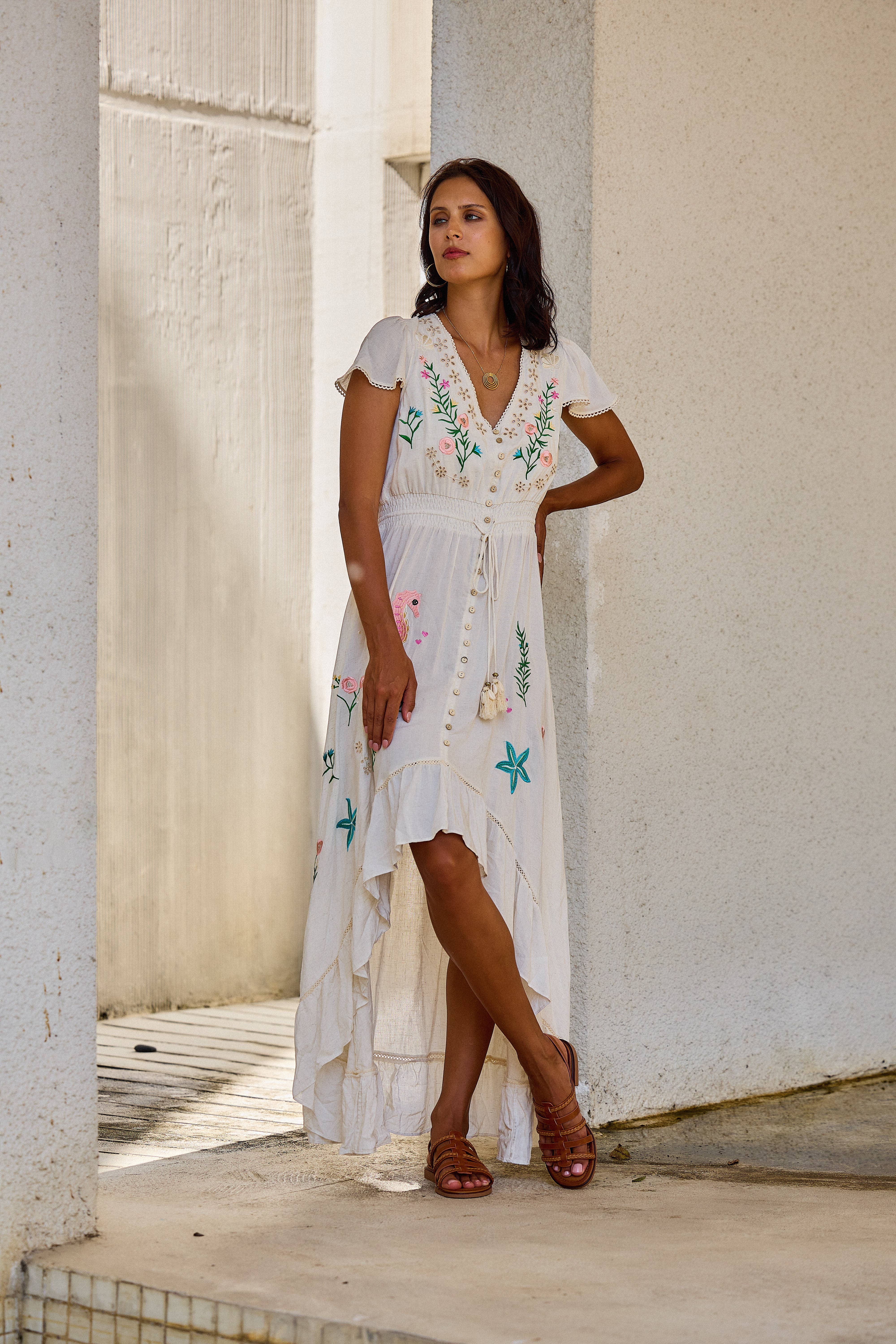 White Asymmetrical long dress with floral embroidery, v-neck for wholesale on Faire3