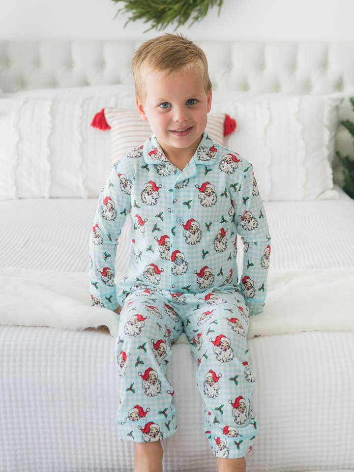 SoftSnooze™ Boys Blue Dear Santa Long Sleeve Button Up Pajama Set
for wholesale by RuffleButts + RuggedButts