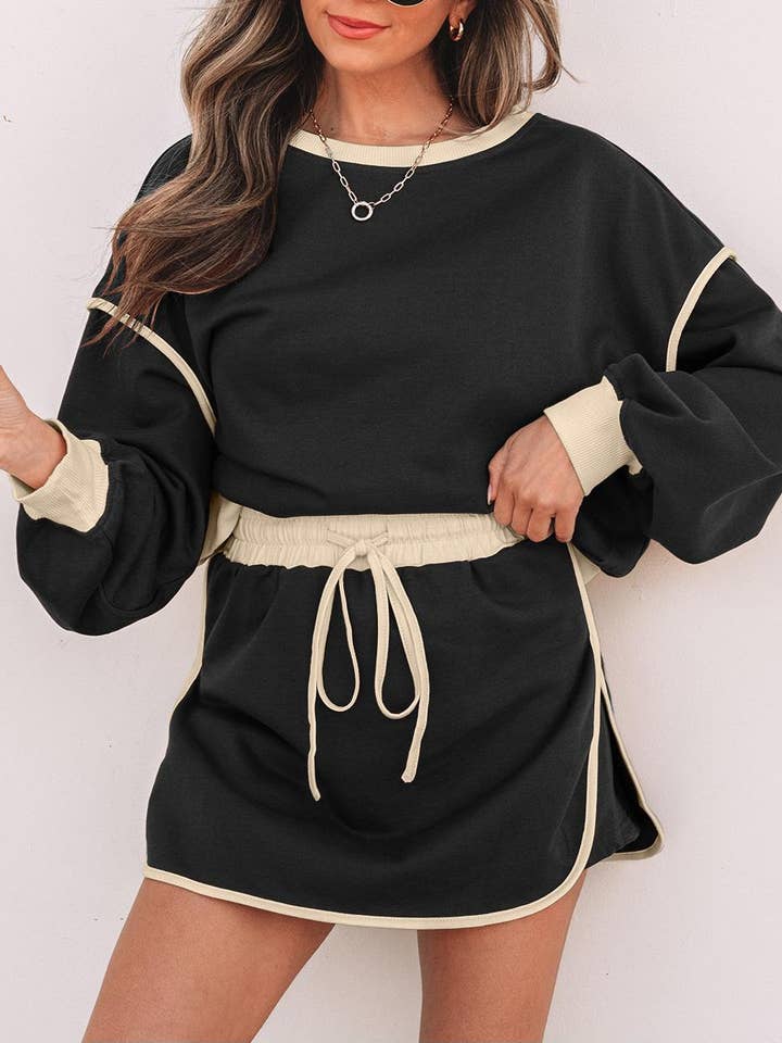 Color Contrast Loose Pullover and Lace-up Waist Skort Set and other Purchase Wholesale skort set. Free Returns & Net 60 Terms on Faire trending on Faire.