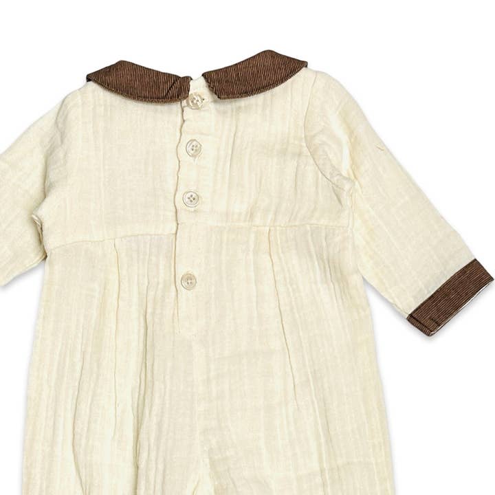 Sweet Cream Embroidered Crinkled Muslin Baby Jumpsuit (Organic) for wholesale on Faire