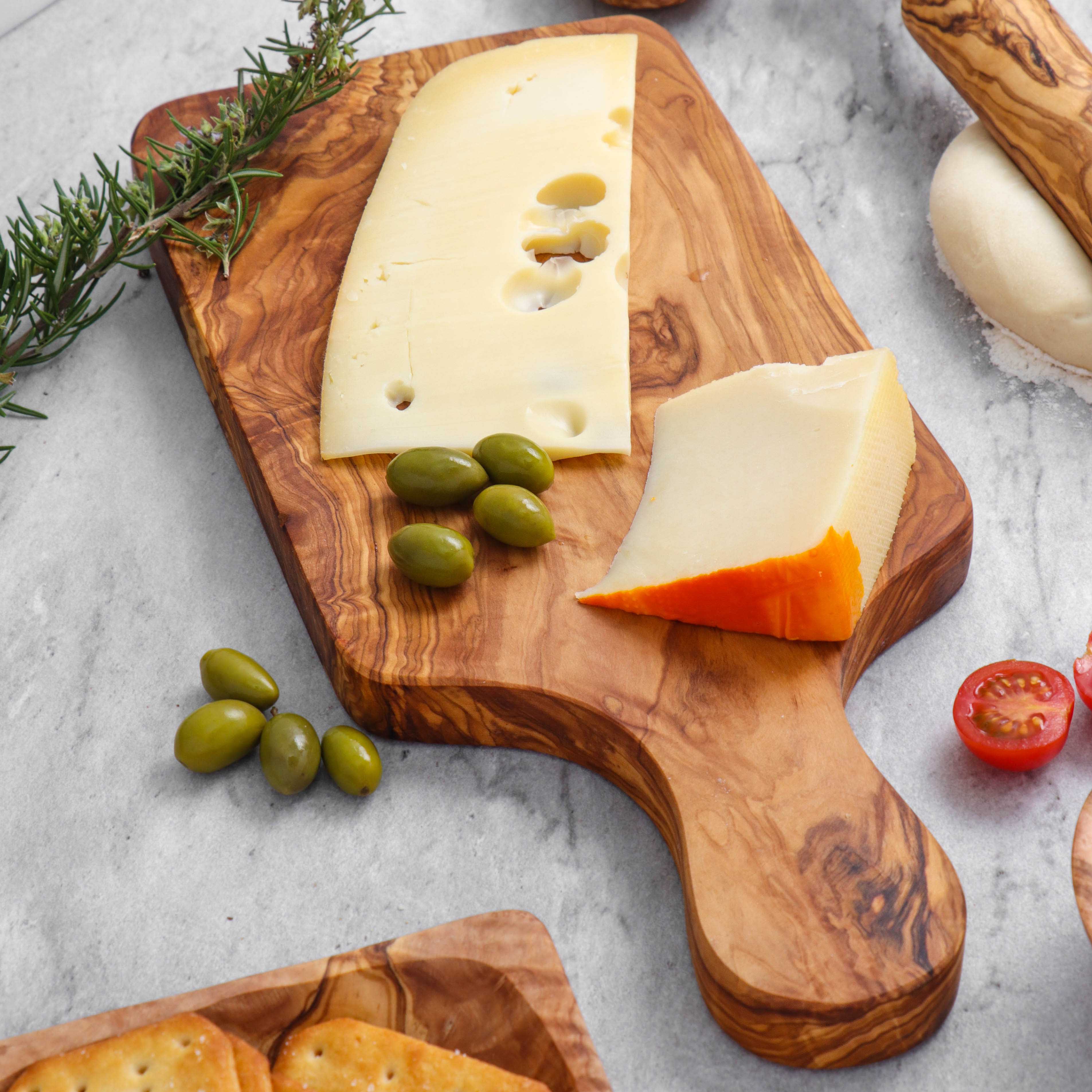 ArtisRaw Olive Wood - Wholesale Cutting Board - Rectangular Cutting Board with integrated circular handles4