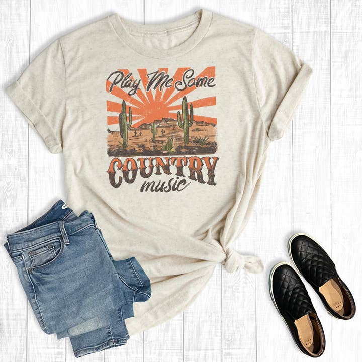 Camiseta gráfica western “Play Me Some Country Music” por atacado de The Way Down South