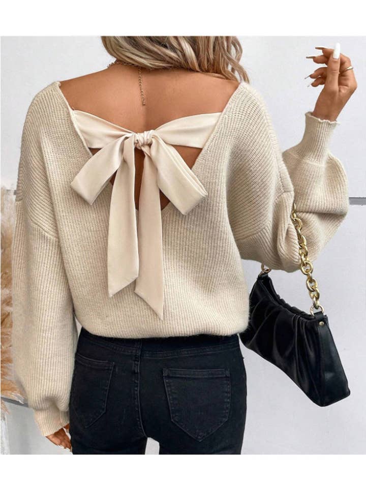 Pull avec détail nœud au dos pour la vente par Soli Echo