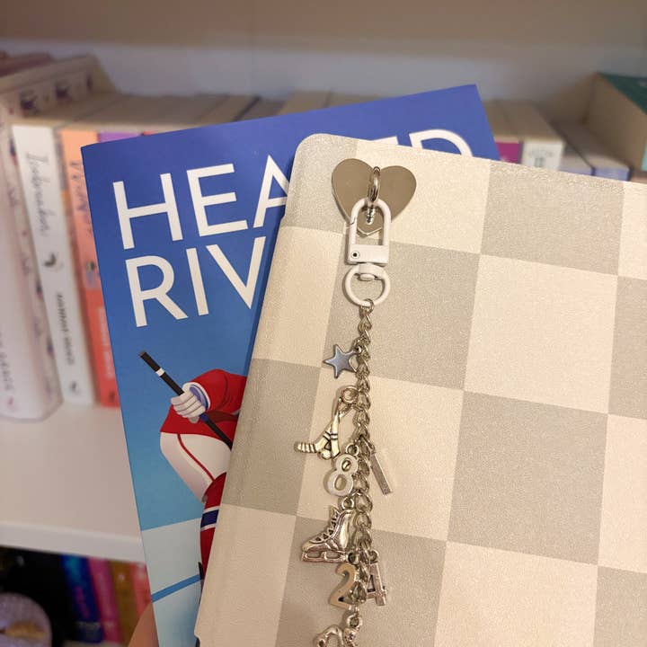 Heated Rivalry Silver Kindle Charm for wholesale by Lover's Library