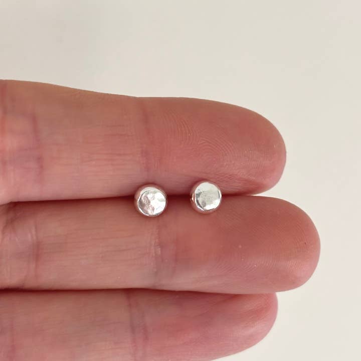 Small sterling silver hammered disc studs for wholesale by Verve Jewellery