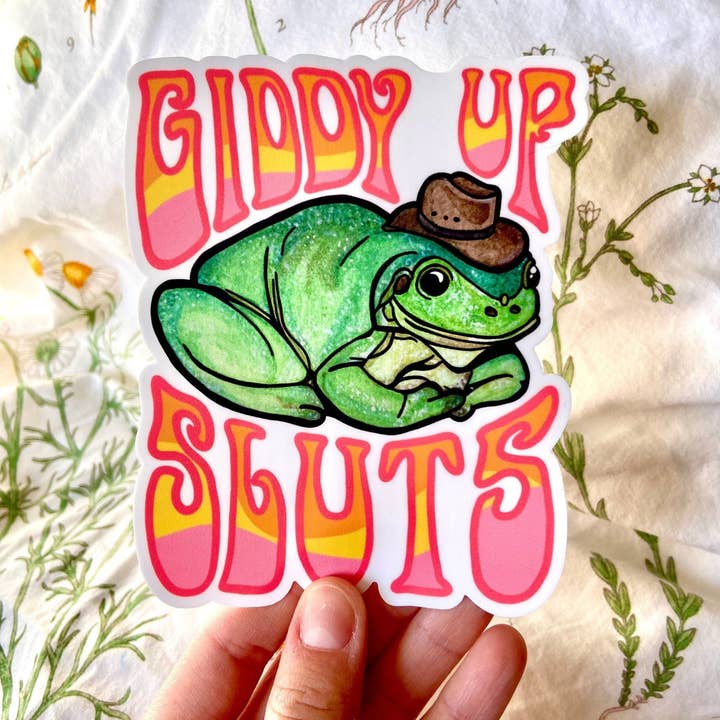 Hollandaize Art - Wholesale Sticker - "Giddy Up Sluts" Cowboy Frog Bumper Sticker