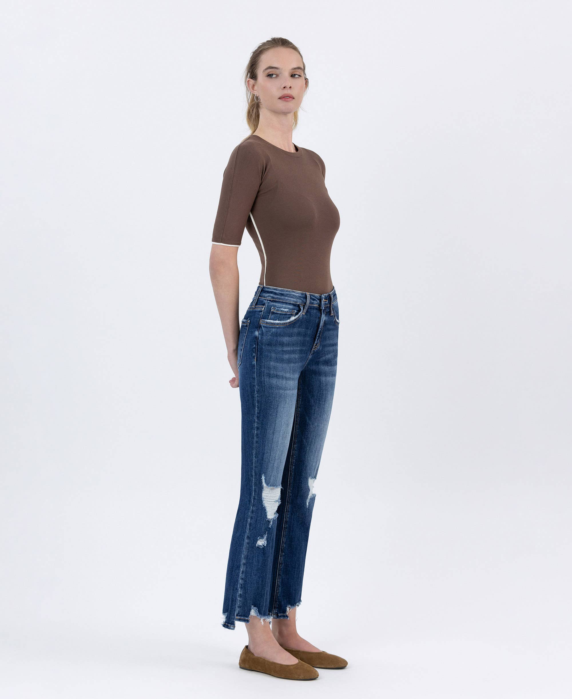 SPELLBOUND MID RISE SLANT STEP HEM CROP KICK FLARE JEANS LV1163 for wholesale on Faire4