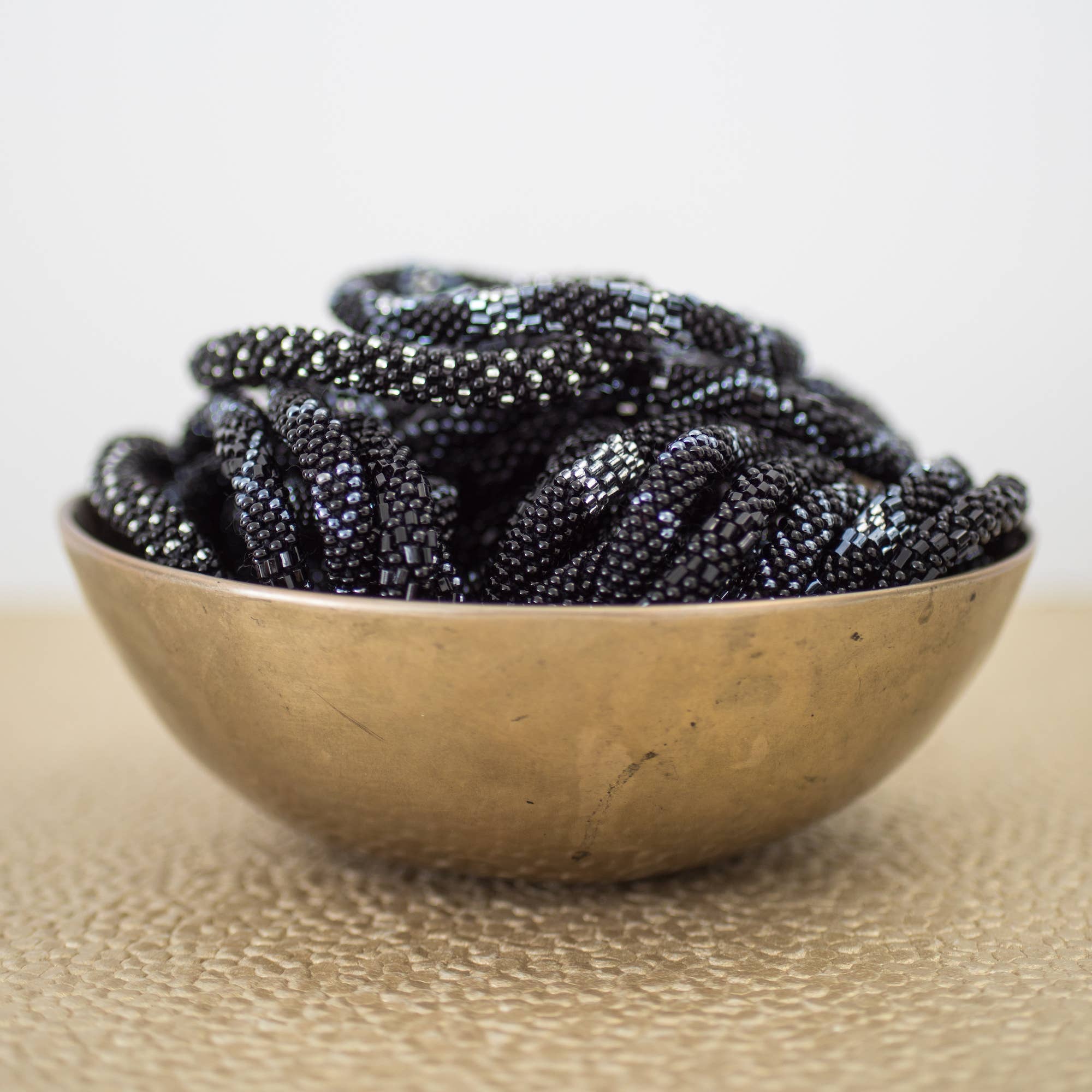 Aid Through Trade - Wholesale Jewelry Set - Roll-On® Bracelets Stiletto - Set of 121