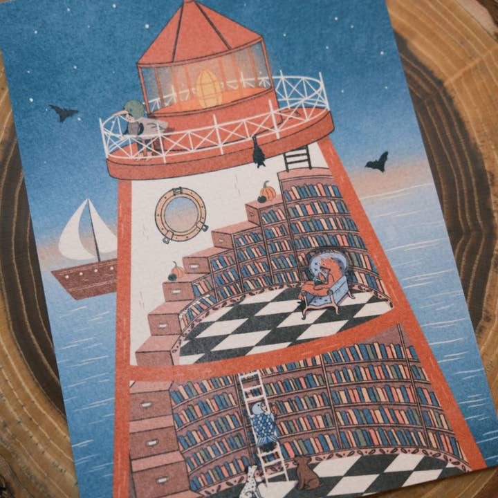 Justine Gilbuena - Wholesale Postcard - Spooky Lighthouse Bookshop Postcard Art Print