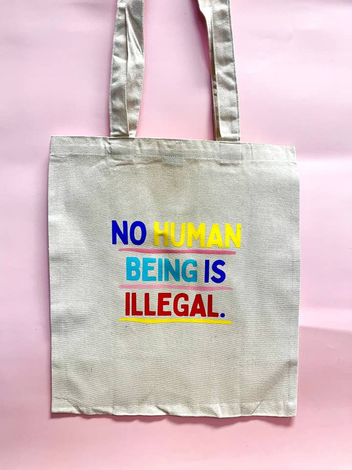 No Human Being is Illegal Tote Bag for wholesale by Hands Producing Hope
