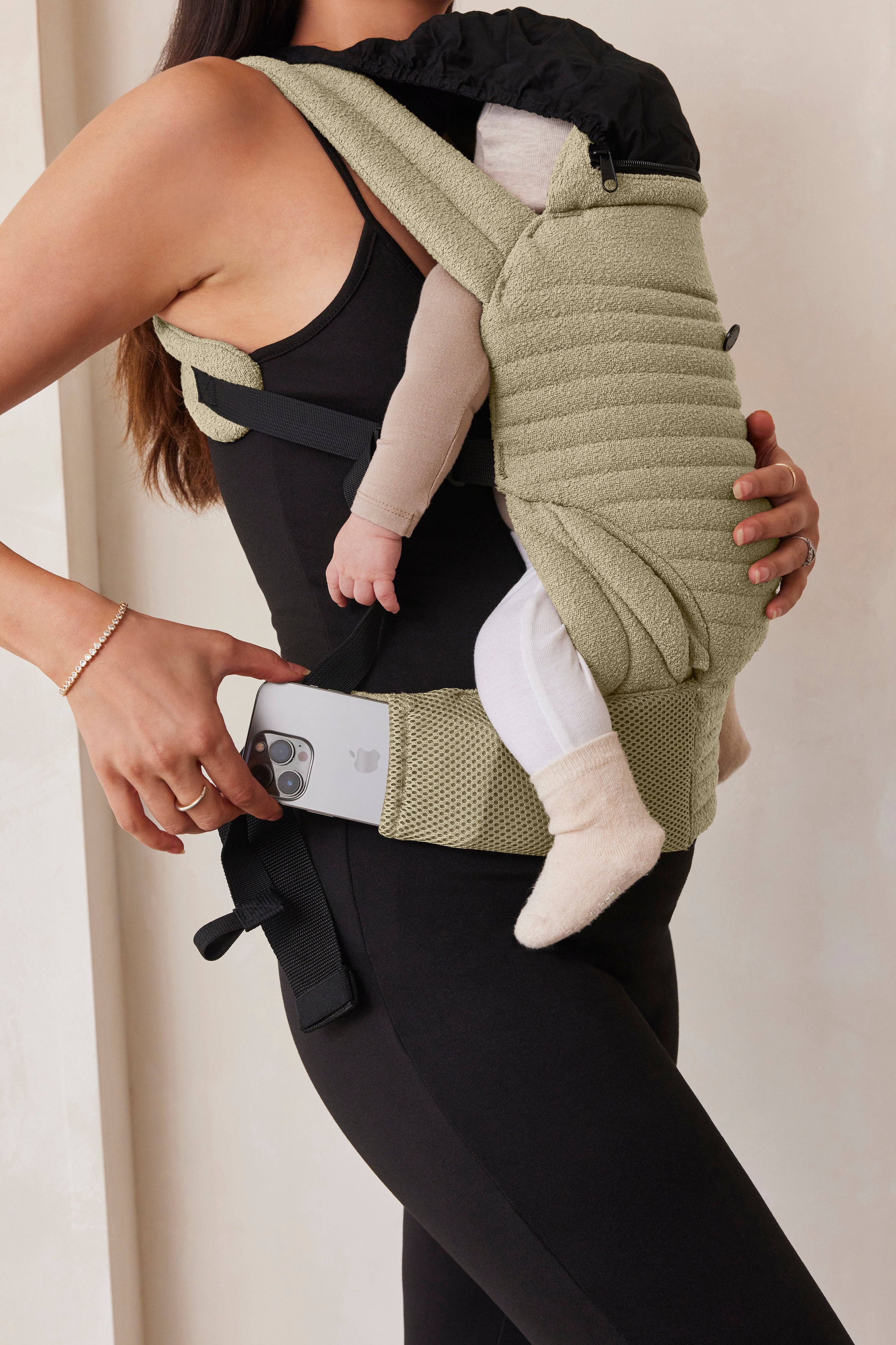 The Armadillo Baby Carrier - Matcha for wholesale on Faire9