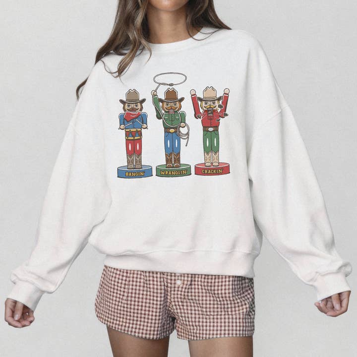 Lucy + Company - Wholesale Graphic Sweatshirt - Women's - Cowboy Christmas Nutcrackers Graphic Sweatshirt1