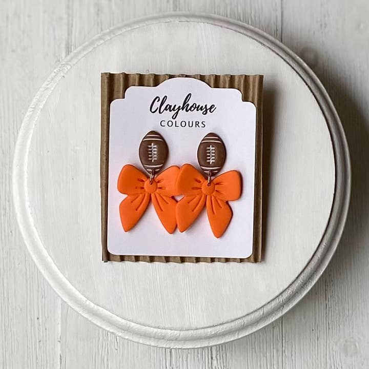 Clayhouse Colours - Vente Boucles d'oreilles pendantes - Boucles d'oreilles Football & Nœud10