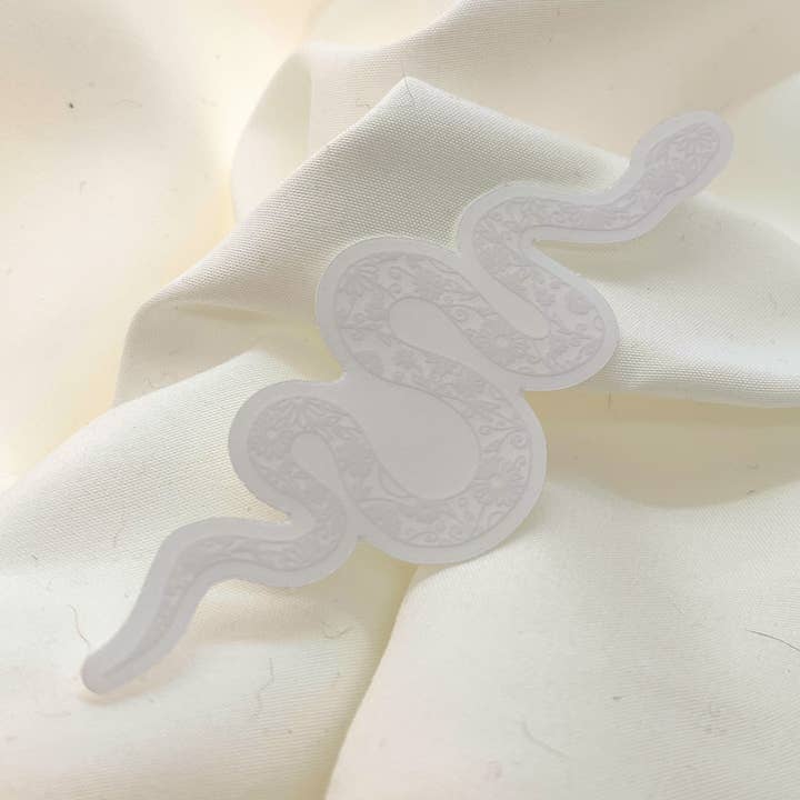White Floral Snake Clear Sticker for wholesale by Artwithnaomi