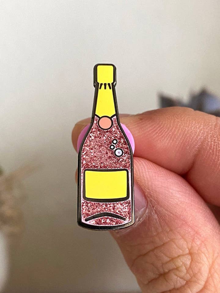 Pink Champagne Pin (Glitter) for wholesale by Hype Pins