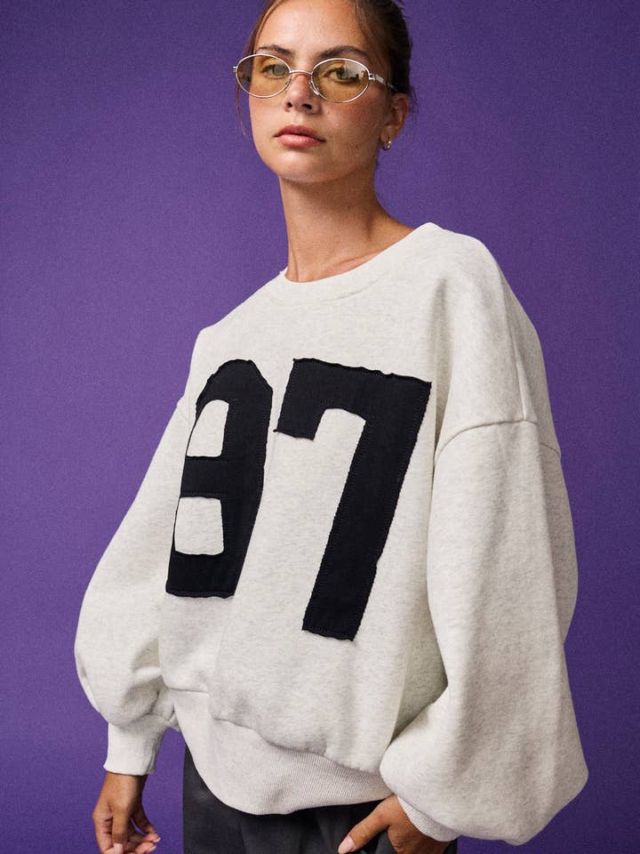 PT50555-4 87 Varsity Number Graphic Pullover for wholesale by Papermoon