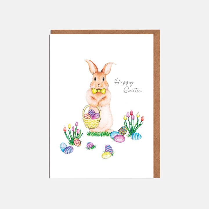 Easter Bunny, Eggs & Flowers Easter Card - 'Happy Easter' for wholesale by Lottie Murphy