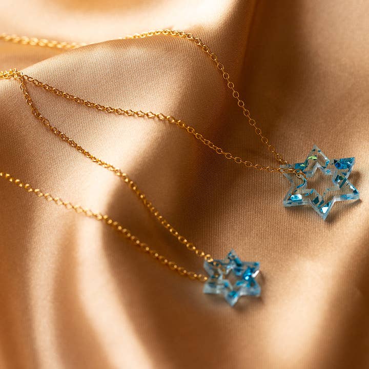 Petite Floating Magen Necklace Blue Fleck for wholesale by Ariel Tidhar