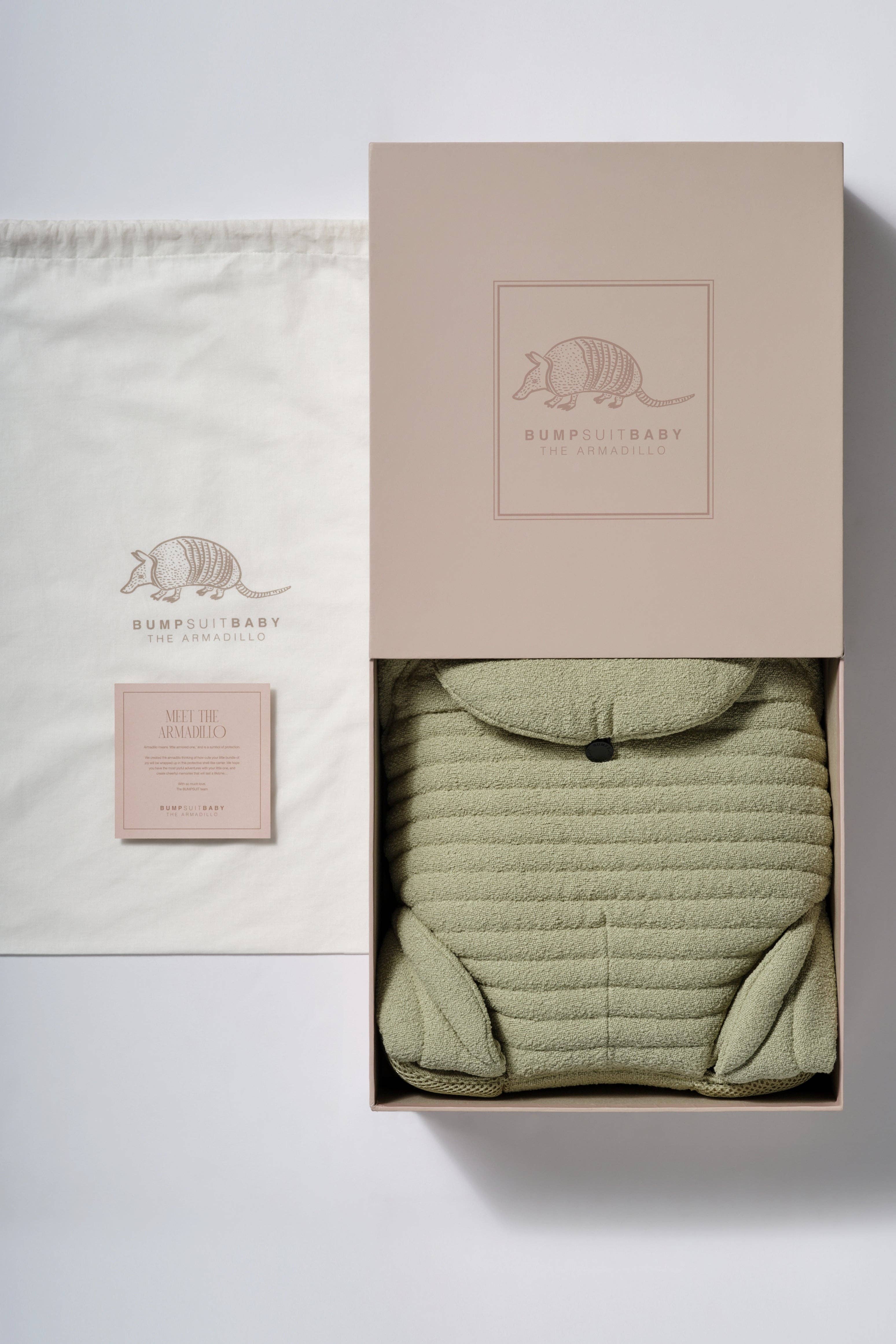 The Armadillo Baby Carrier - Matcha for wholesale on Faire2