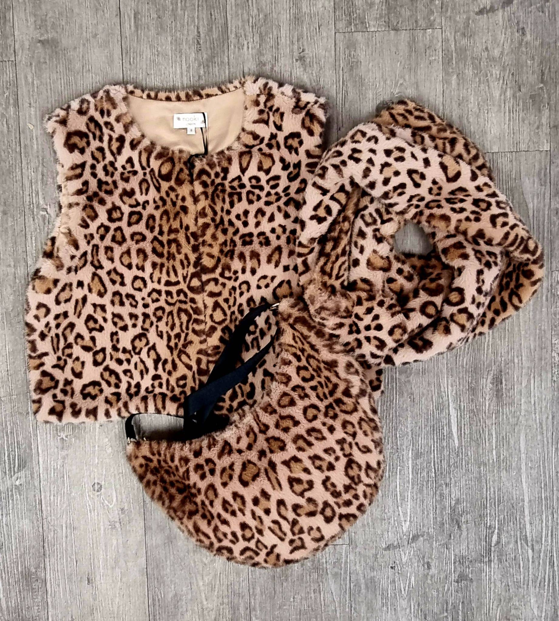 LEO SIMONE SLOUCH BAG IN LEOPARD for wholesale on Faire1