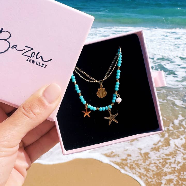 Bazou – Großhandel Kette mit Anhänger/Charm – Dreifachkette mit Seestern - Mint/Gold