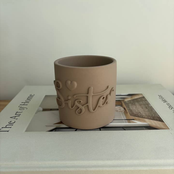 Syster Präglad Betongljuskruka för wholesale av Fancy Concrete