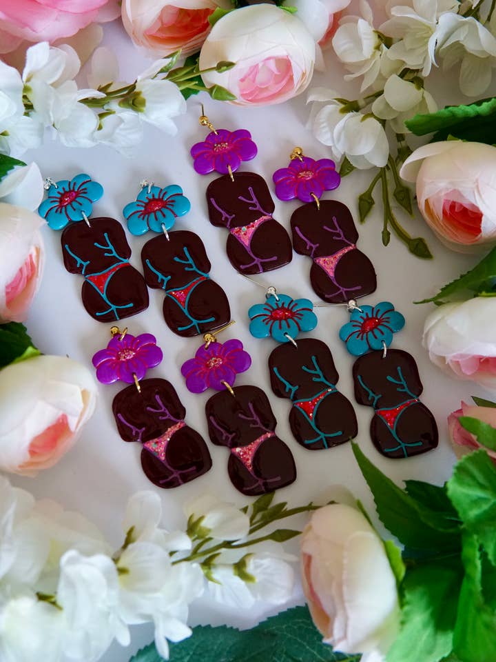 Floral female torso polymer clay earrings for wholesale by Bunnie Sparkles